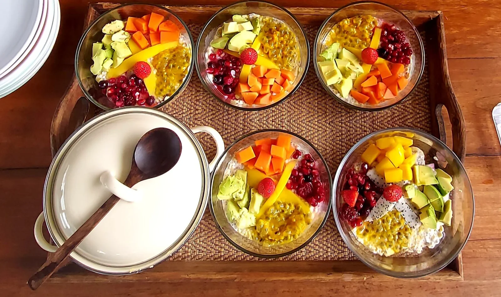 Fresh fruit and vegetarian dishes ready for a shared meal