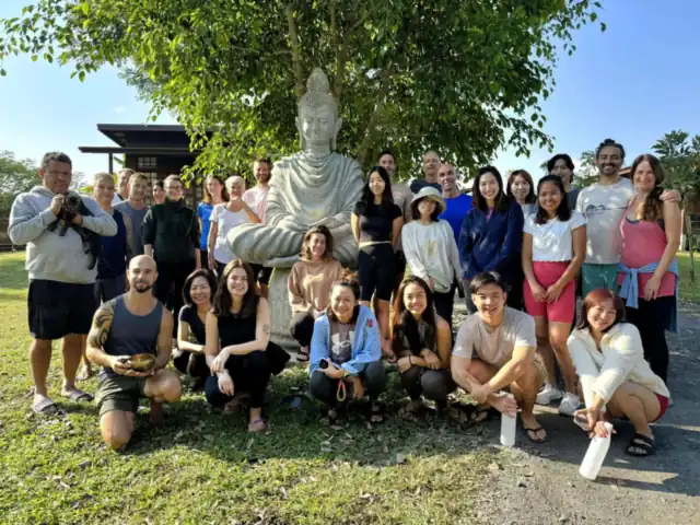 Guests and the True Nature family in the garden