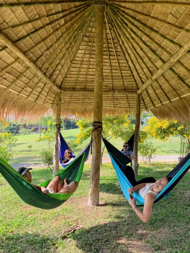 Hammocks under a thatched sala