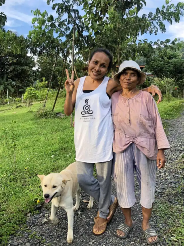 Ning and Yai with one of the dogs