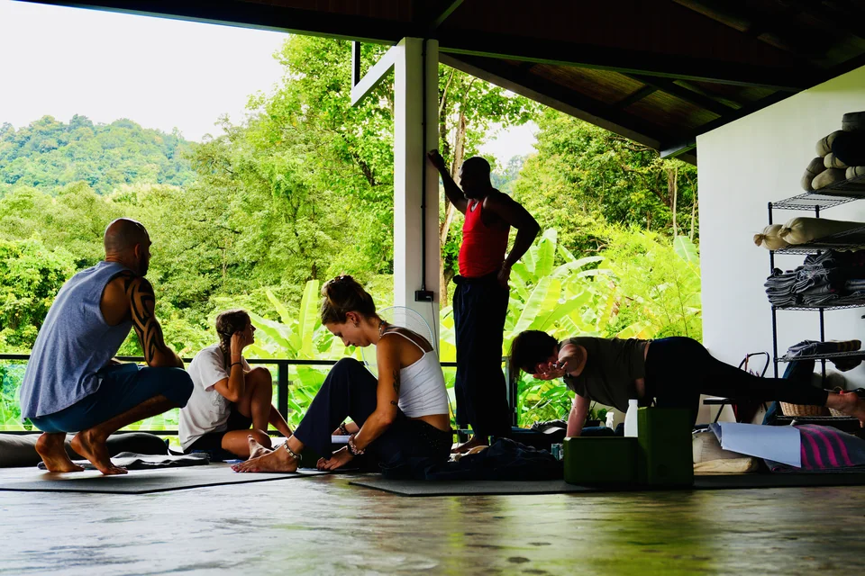 Teacher training students learning together in small practical groups