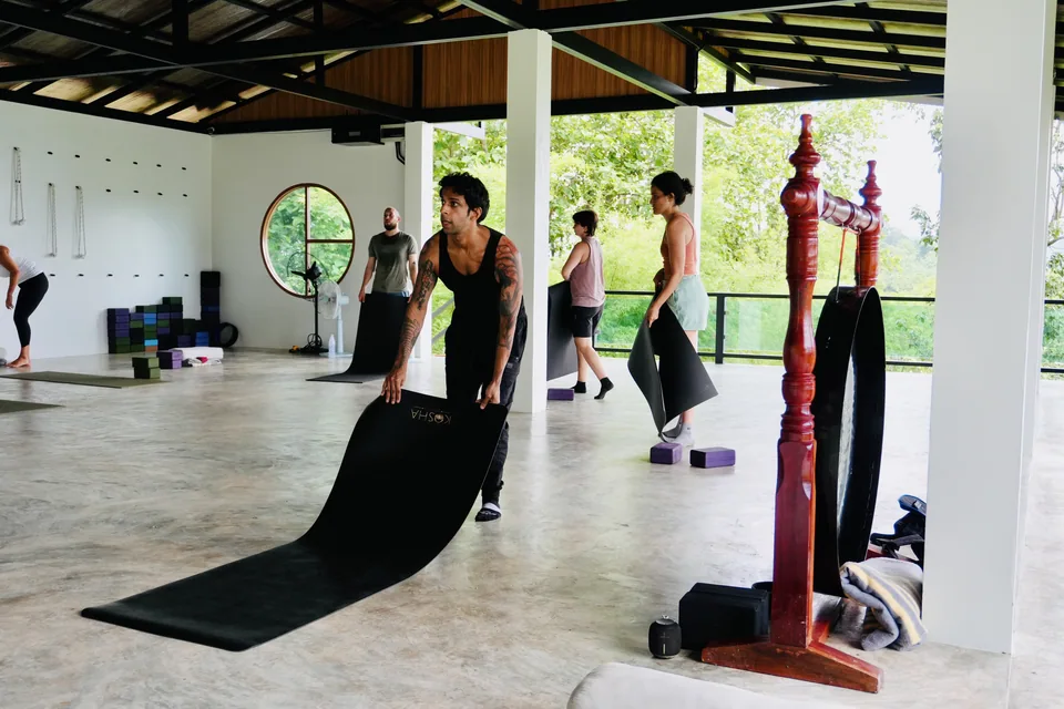 Guests sharing a moment between yoga practices